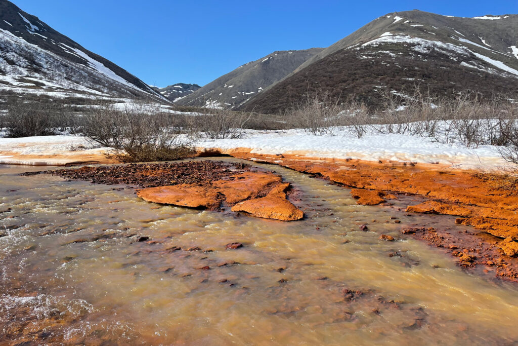 Some streams and rivers in Alaska’s remote Brooks Mountain Range are turning orange. Researchers think melting permafrost may be the culprit. Credit: Josh Koch/USGS