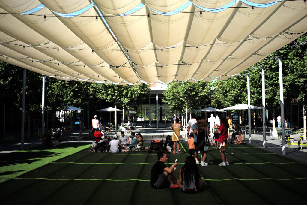 People rest under the shade in San Ramon as a heat wave hits the San Francisco Bay Area in July 2021. Credit: Wu Xiaoling/Xinhua via Getty Images