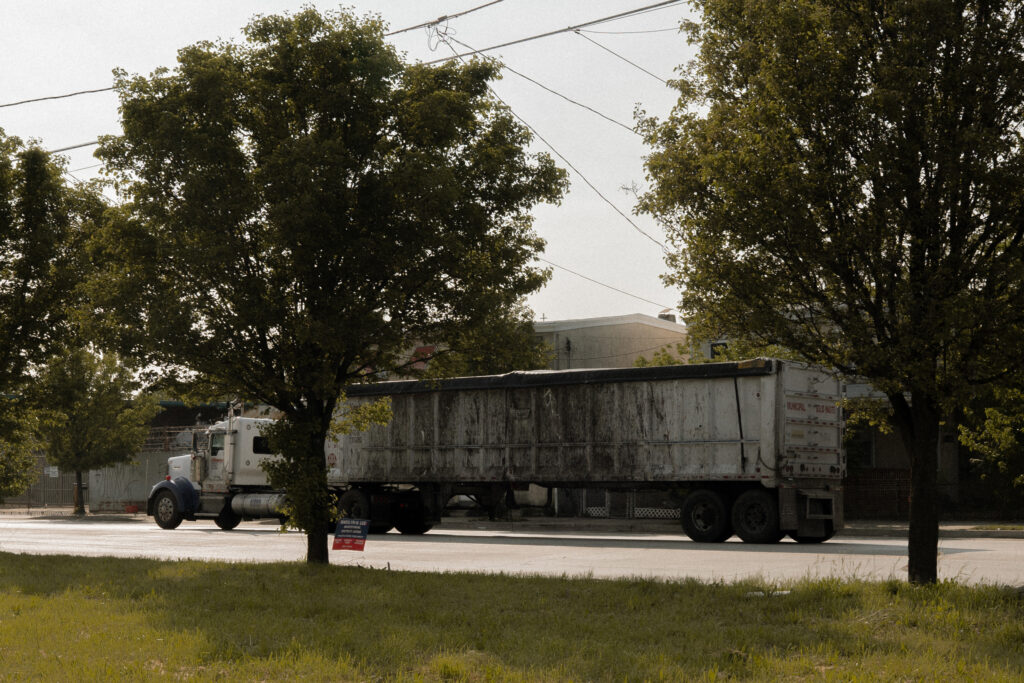 The nuisance of long-haul garbage trucks have led towns and villages across the Finger Lakes to pass resolutions opposing a bid to expand the state’s largest landfill. Credit: Caroline Gutman/The Washington Post via Getty Images